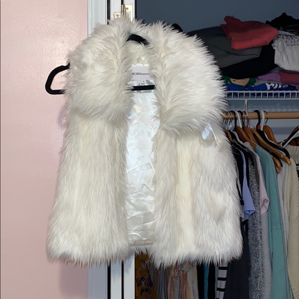 White fake fur vest